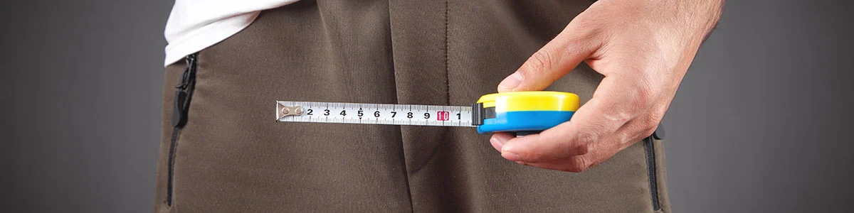 man with measuring tape  for measuring penis